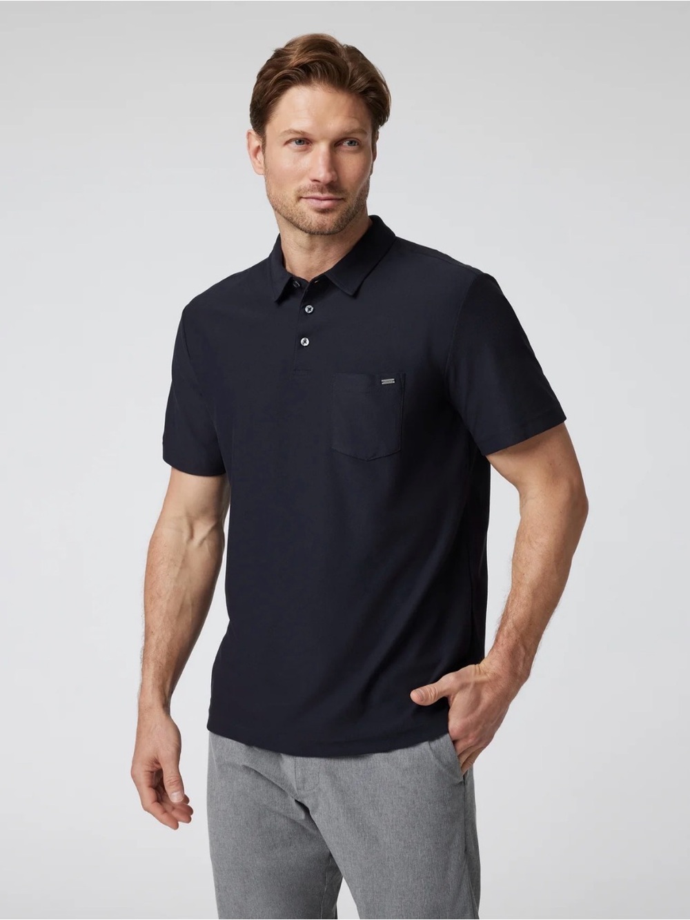 Vuori Men's Ace Short-Sleeve Polo in Black with Chest Pocket. Men’s Medium.